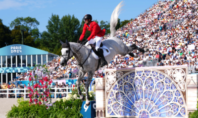 Équitation JO 2024 Christian Kukuk en or sur le saut d'obstacles individuel, Julien Épaillard au pied du podium