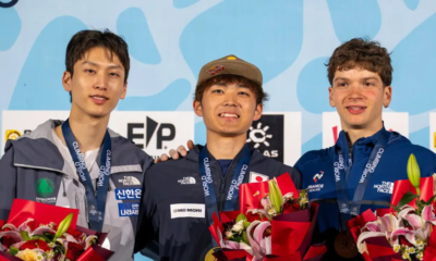 Mejdi Schalck sur le podium du bloc en Coupe du monde à Keqiao, Sorato Anraku vainqueur